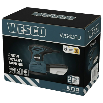 Lijadora Wesco de 240W puliendo la superficie de una mesa de madera, destacando el control de velocidad variable en el agarre superior