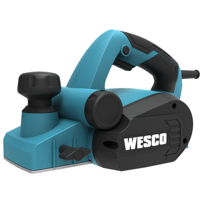 Cepillo eléctrico para madera Wesco de 650W con perilla frontal de ajuste de profundidad, empuñadura de goma y accesorios de guiado.